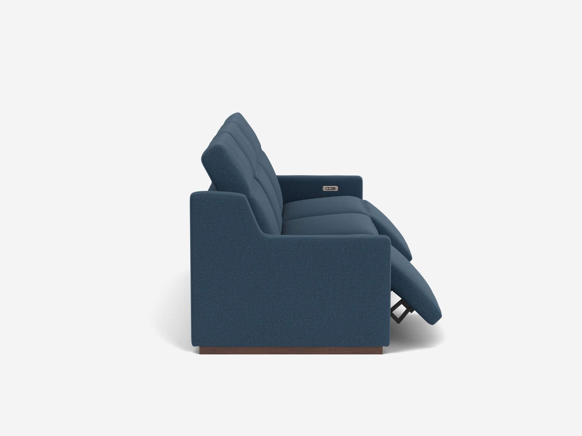 Side view of blue reclining sofa